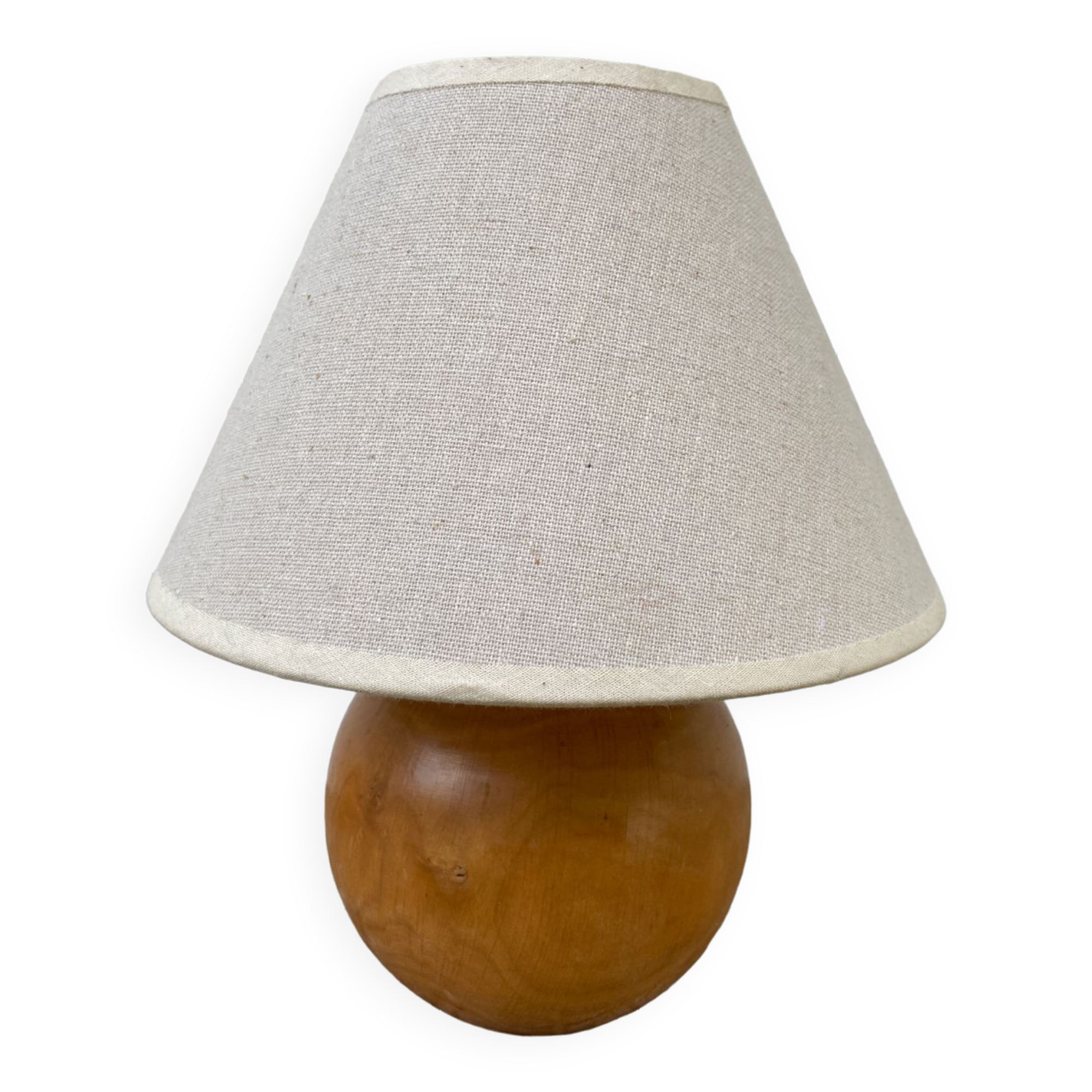 Wooden ball bedside lamp and beige lampshade