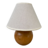 Wooden ball bedside lamp and beige lampshade