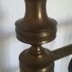 Old bed in black iron and brass