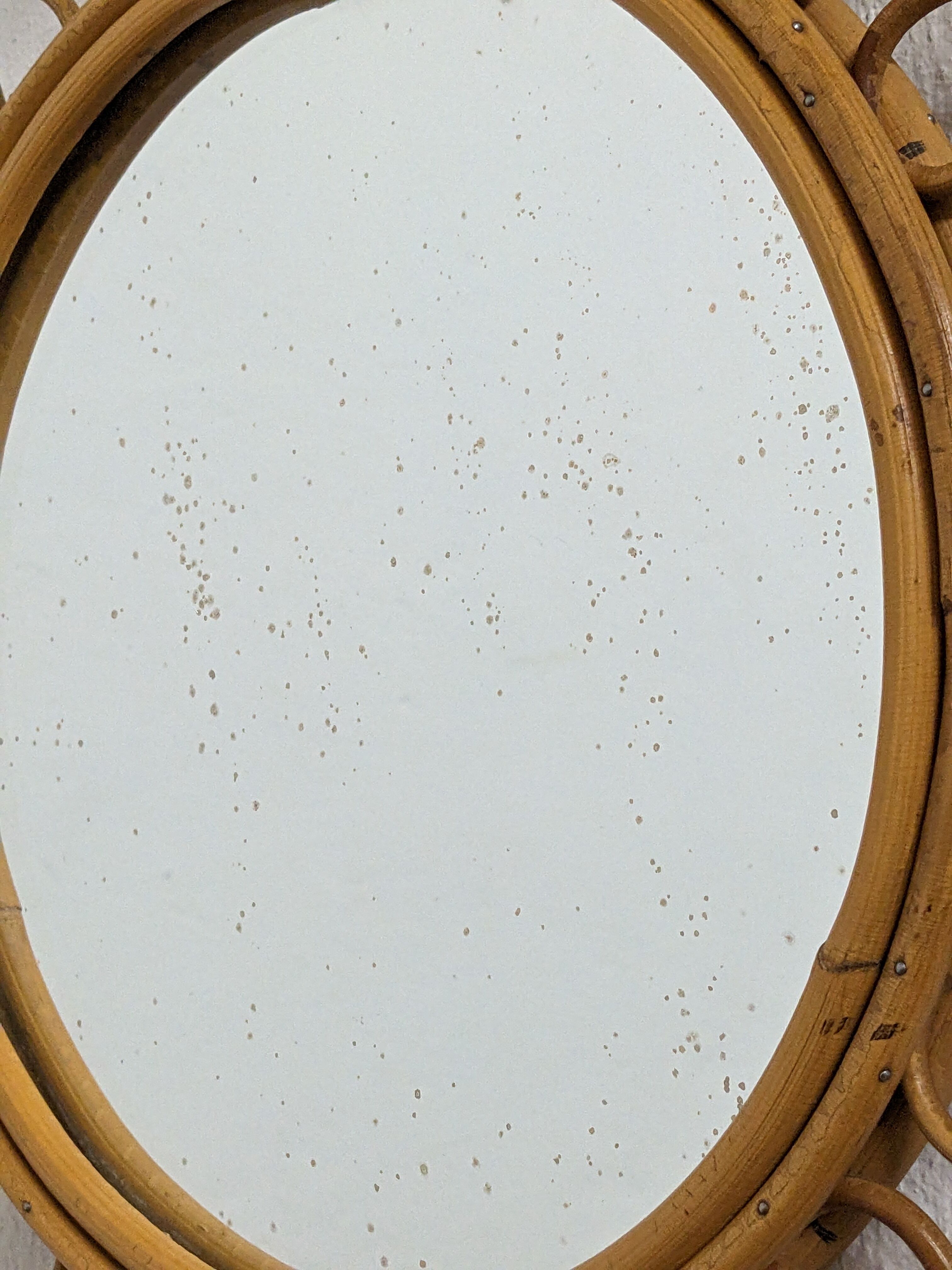 Round rattan mirror from the 50s/60s