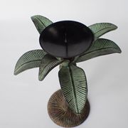 Antique palm tree-shaped candlestick in patinated metal