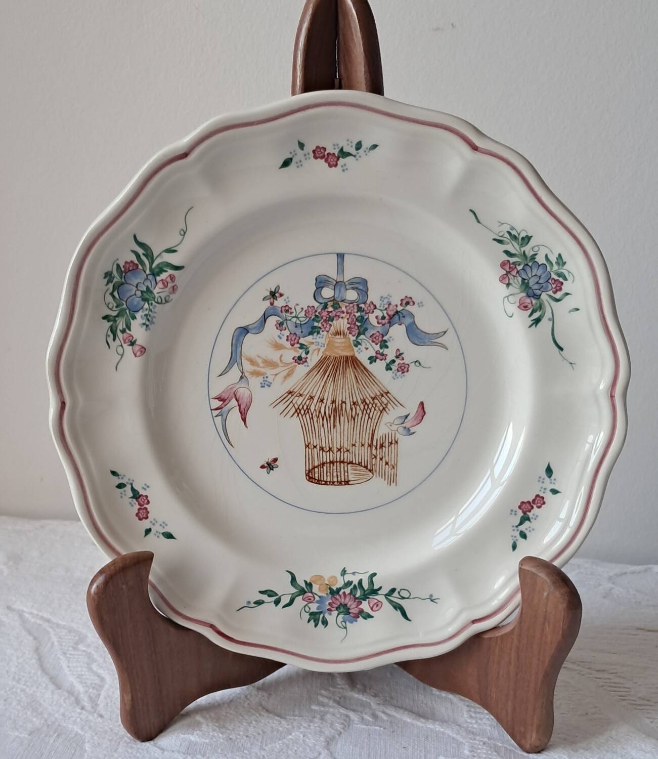 Longchamp earthenware plate. Birdcage decoration