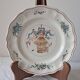 Longchamp earthenware plate. Birdcage decoration