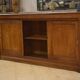 Mahogany workshop furniture with three sliding doors from the 1920s.