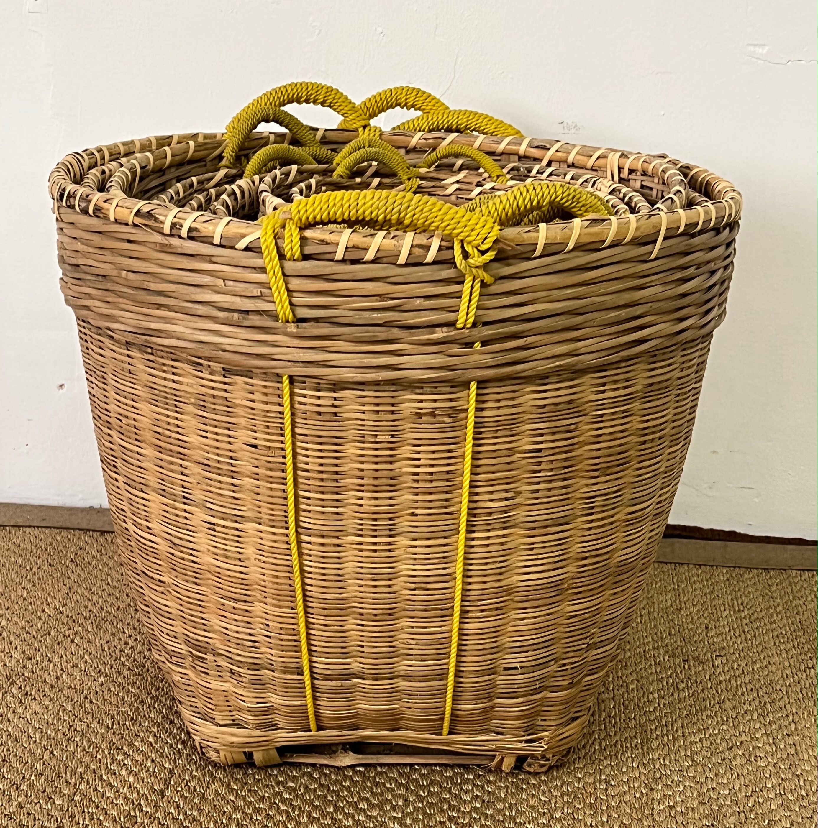 Set of 9 wicker trundle baskets