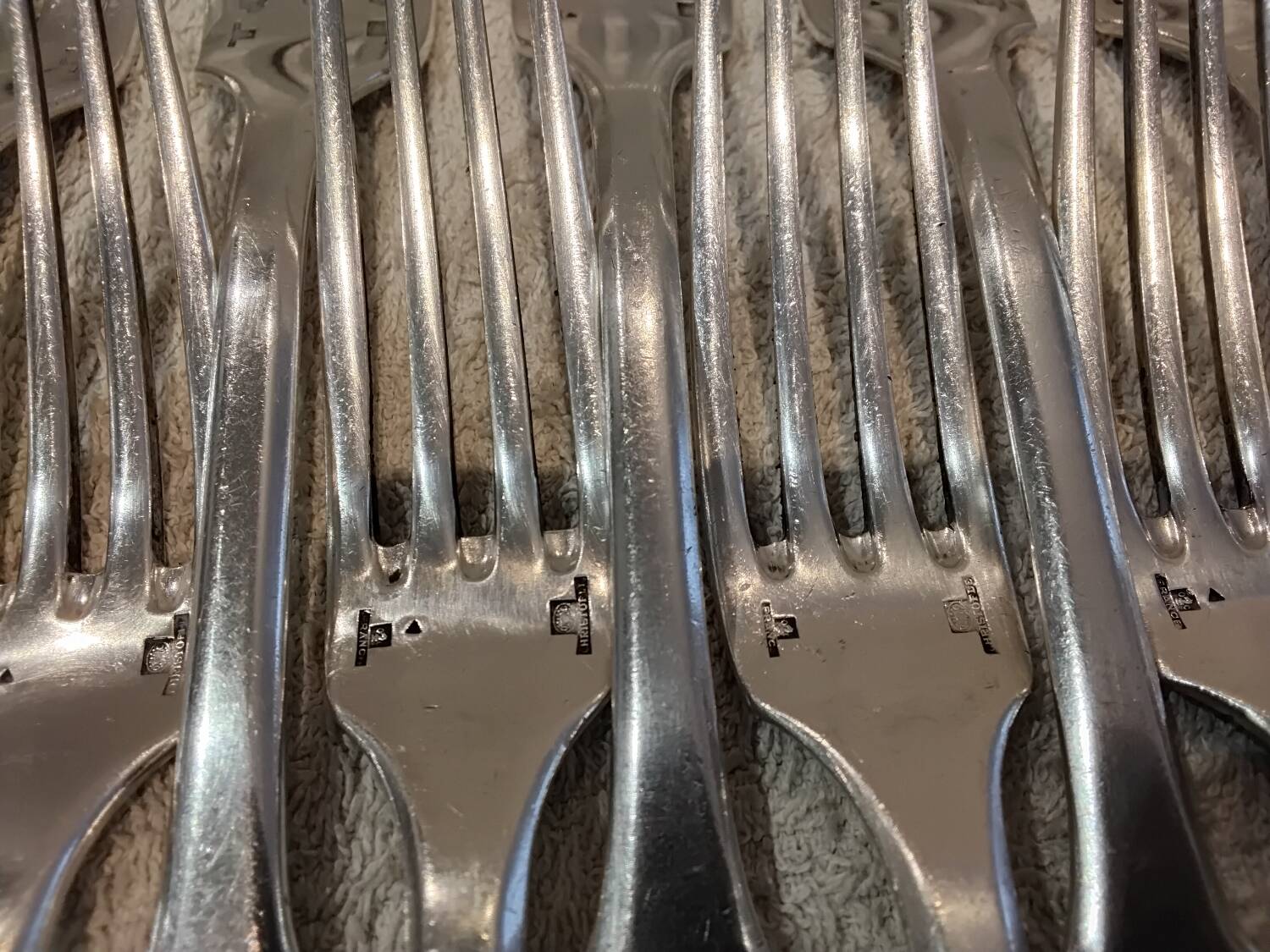 11 silver-plated table forks by Christofle Cluny with stripes
