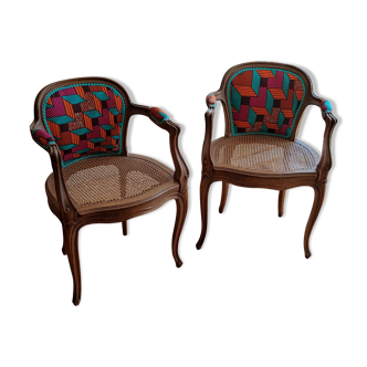 Paire de deux fauteuils dossier wax et assise en cannage