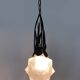 Chandelier, Art Deco suspension in wrought iron and star globe in glass paste.