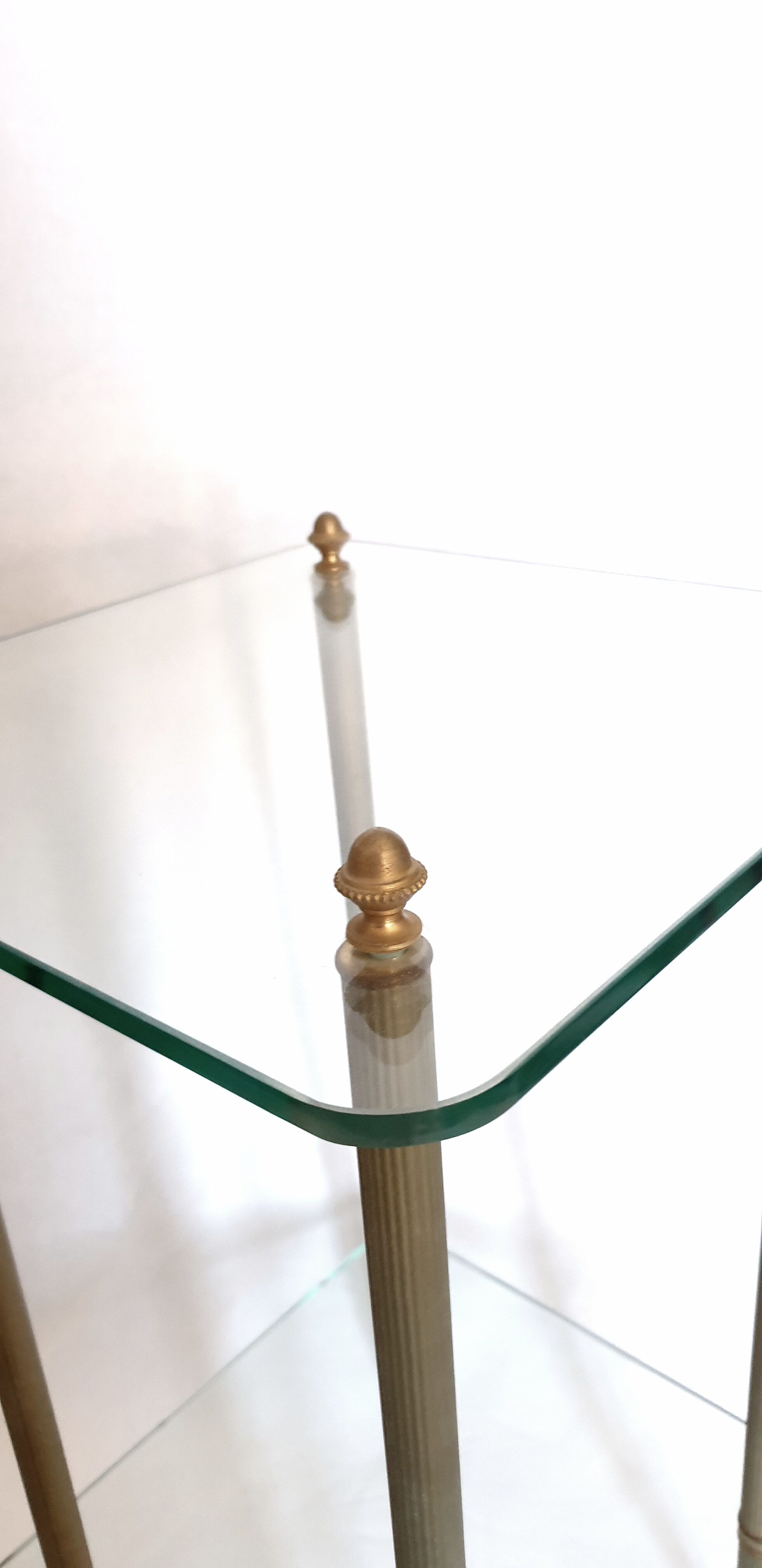 Side table in glass and brass