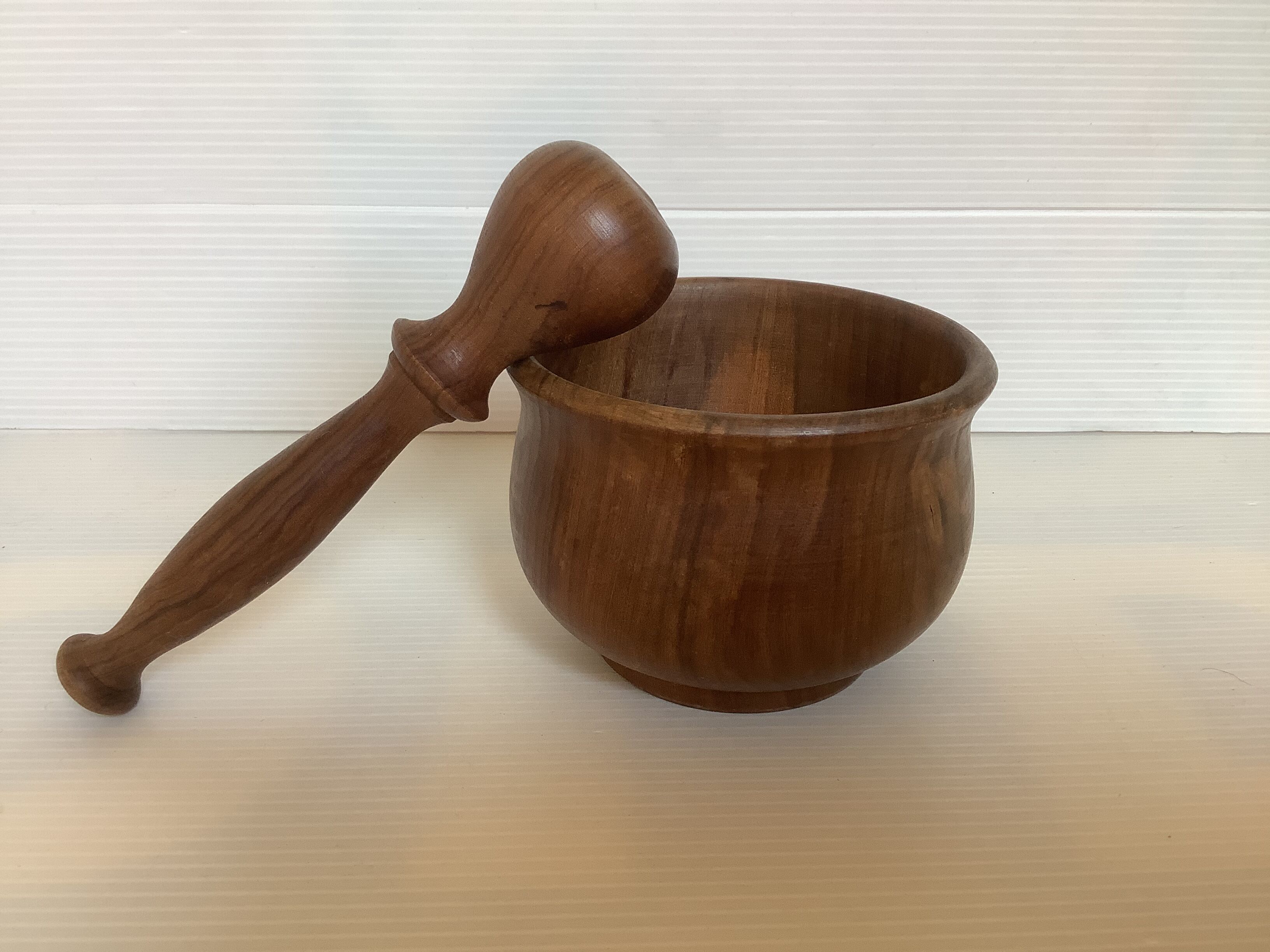 Mortar and wooden pestle