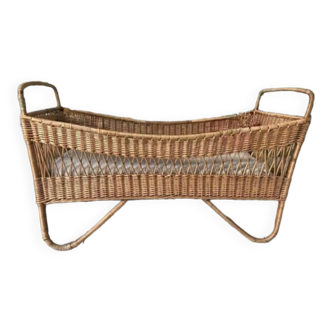 Vintage baby bed in rattan and wicker, old cradle furniture