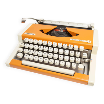 Olympia traveler luxury orange typewriter overhauled and new ribbon