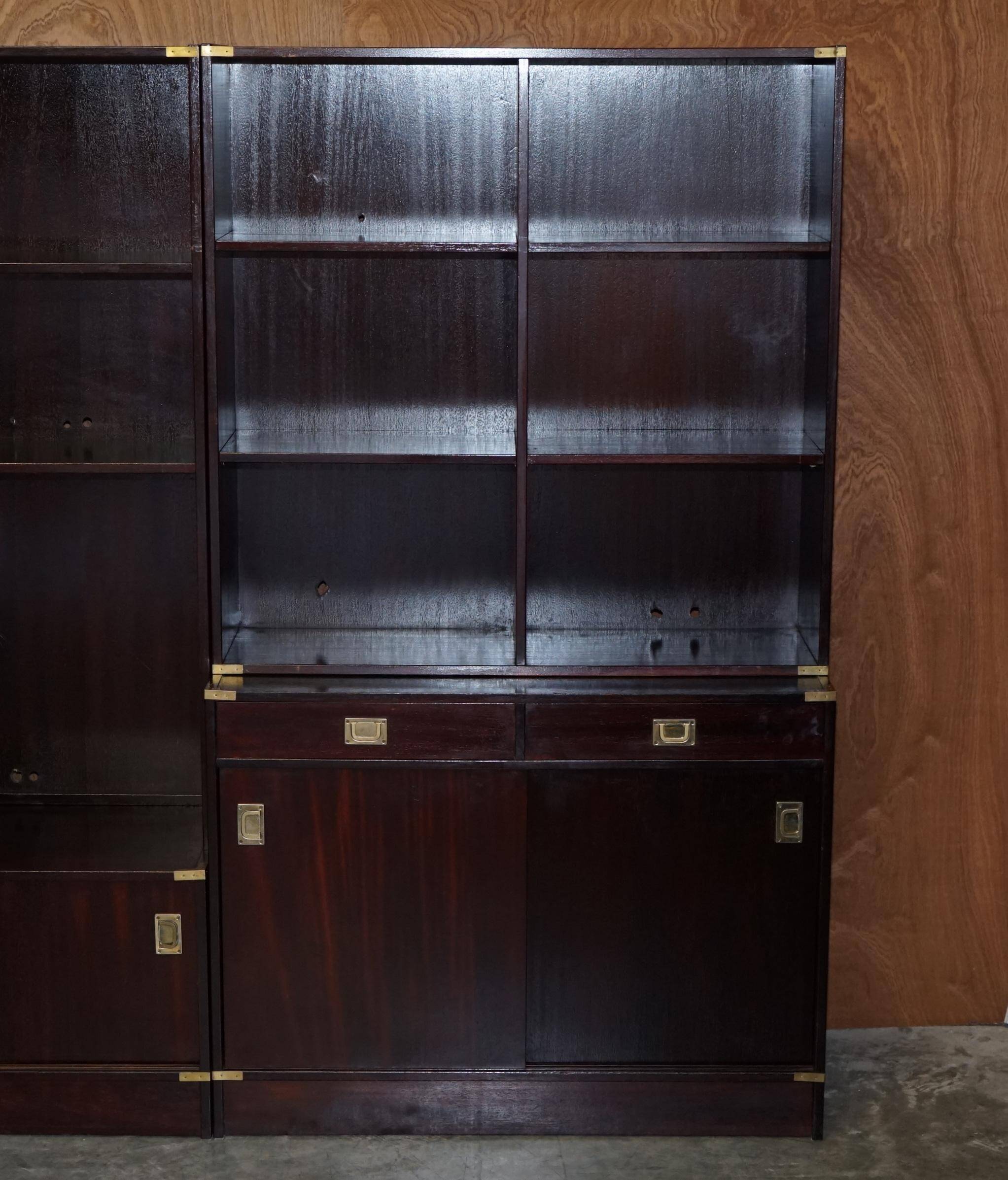 Three vintage style Military Campaign bookshelves, mahogany finish.