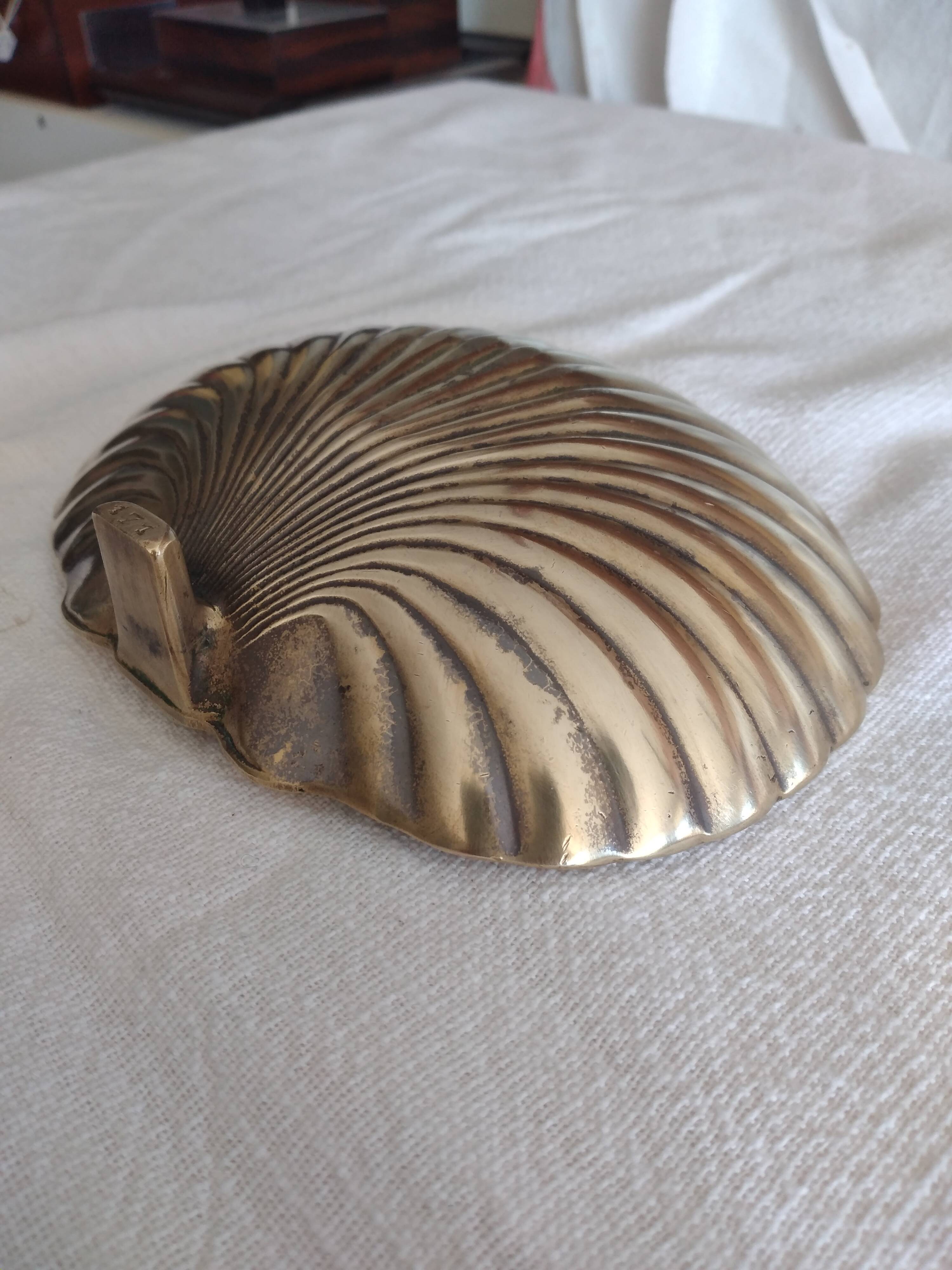 Bronze shell ashtray or pocket emptier