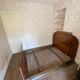 Art deco bed dating from the 30s in Ronce de Noyer