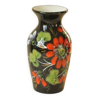 Vintage black ceramic vase with painted floral decoration – stylised colourful flowers.
