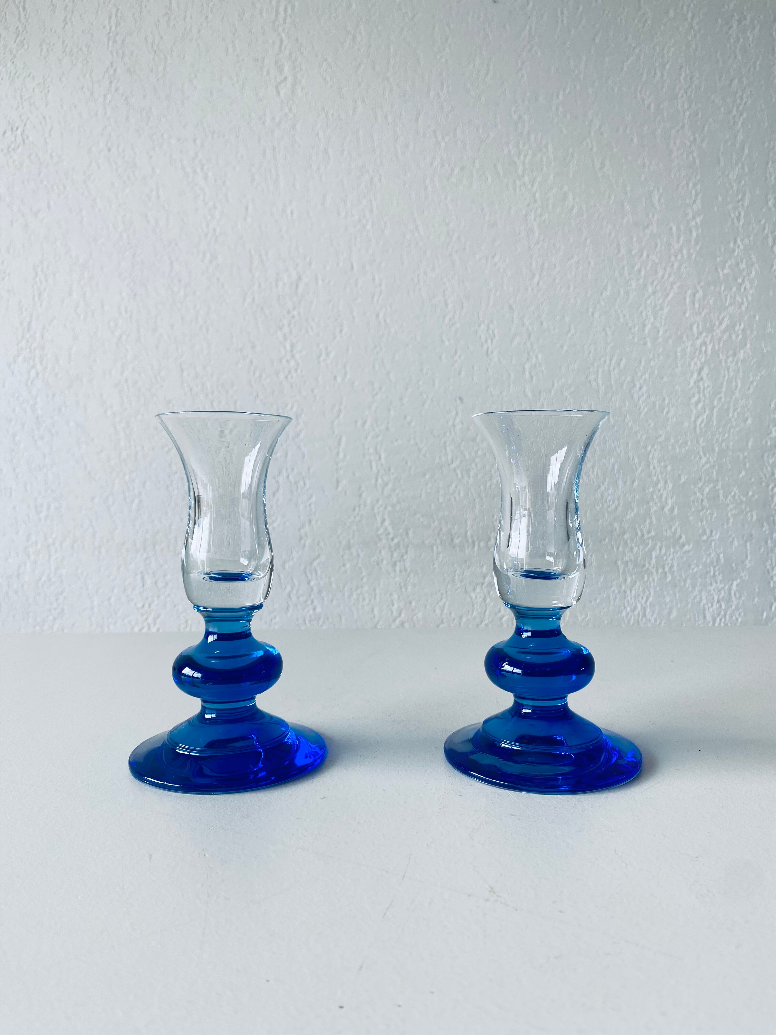 Pair of glass candle holders