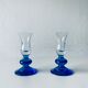 Pair of glass candle holders