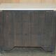 Antique Chinese commode carved in steatite with a marble top.