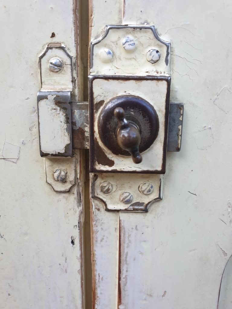 Parisian wall cabinet with locks
