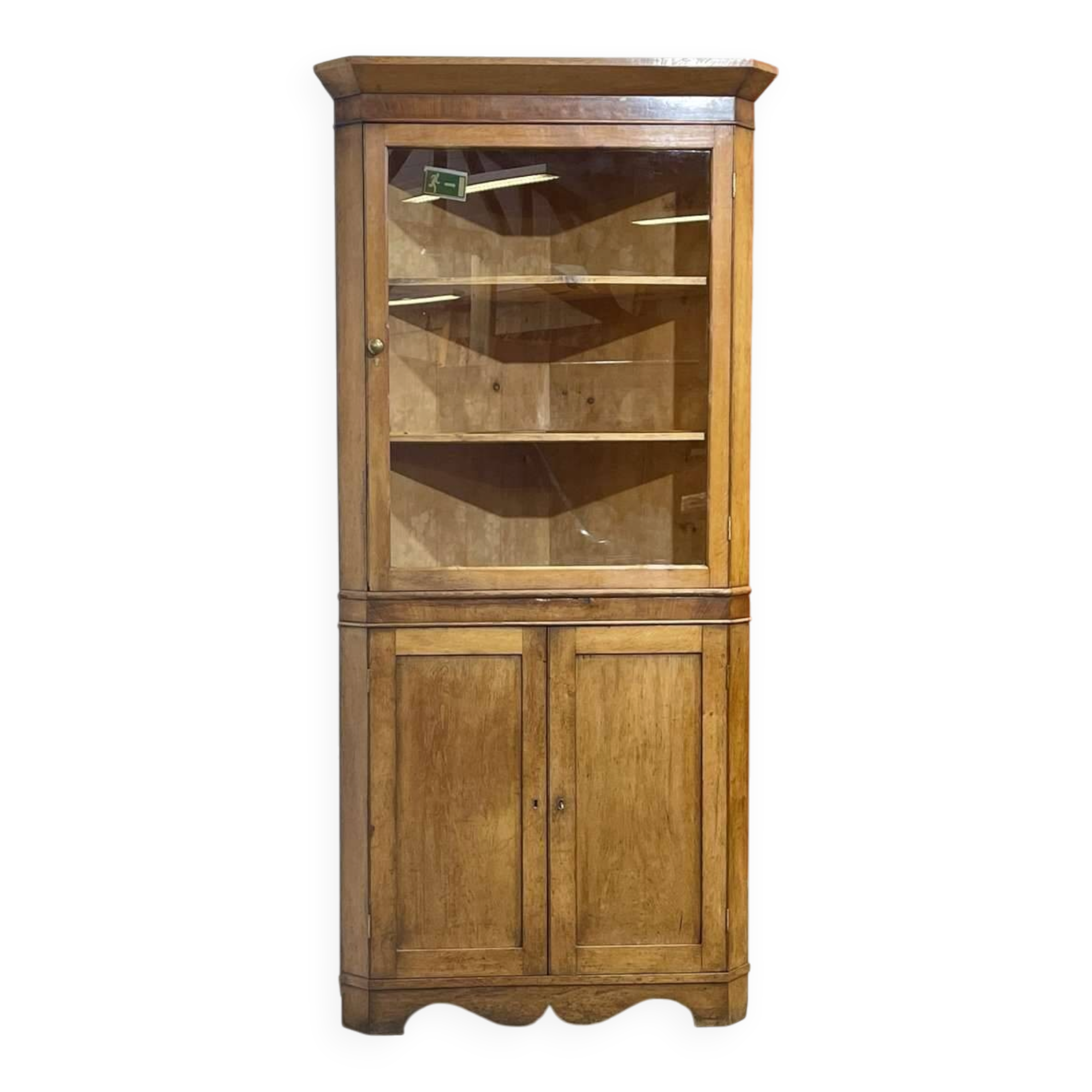 19th-century English corner cabinet in oak, mahogany, and fir.