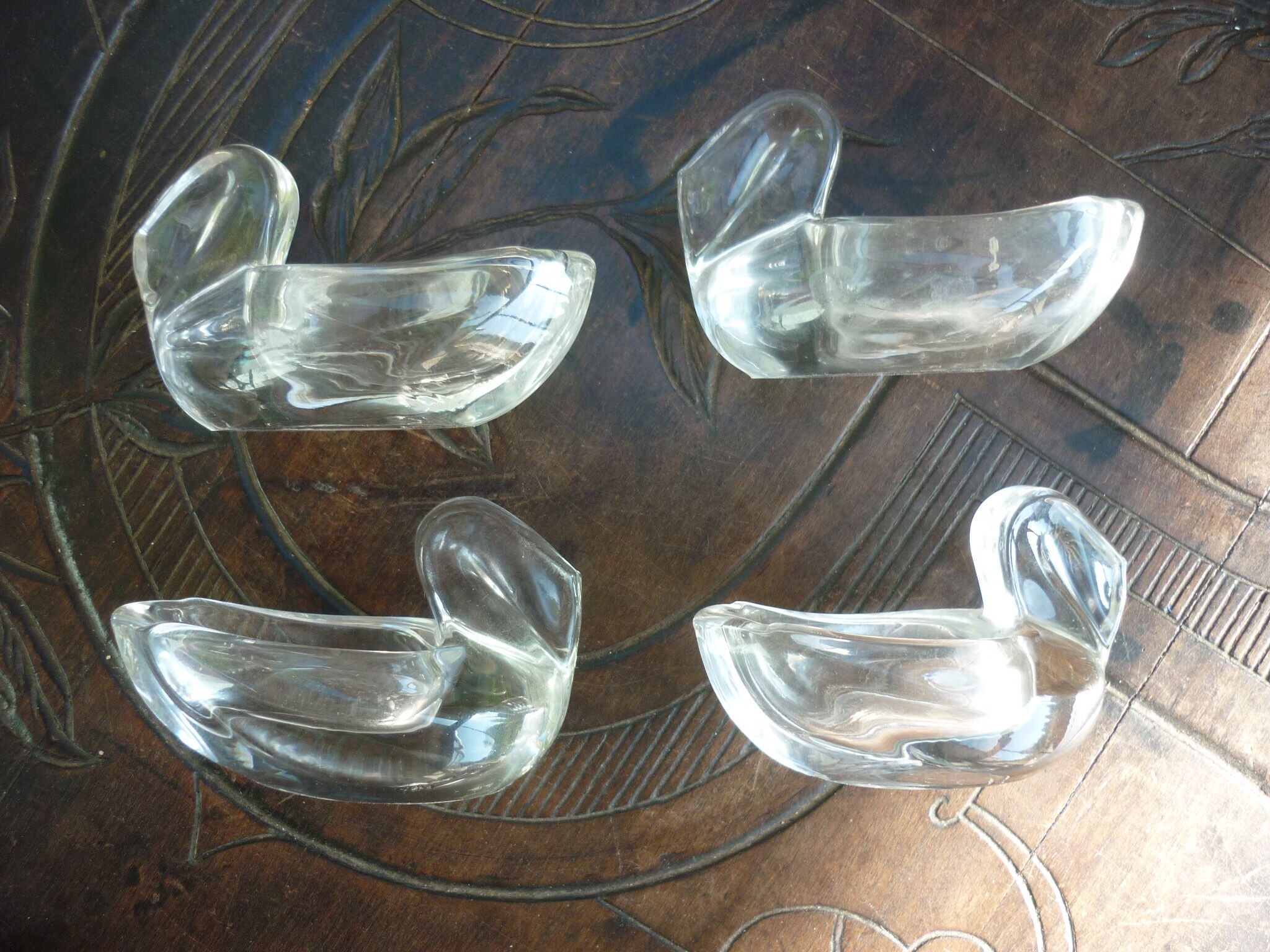 4 stylized swan-shaped salters