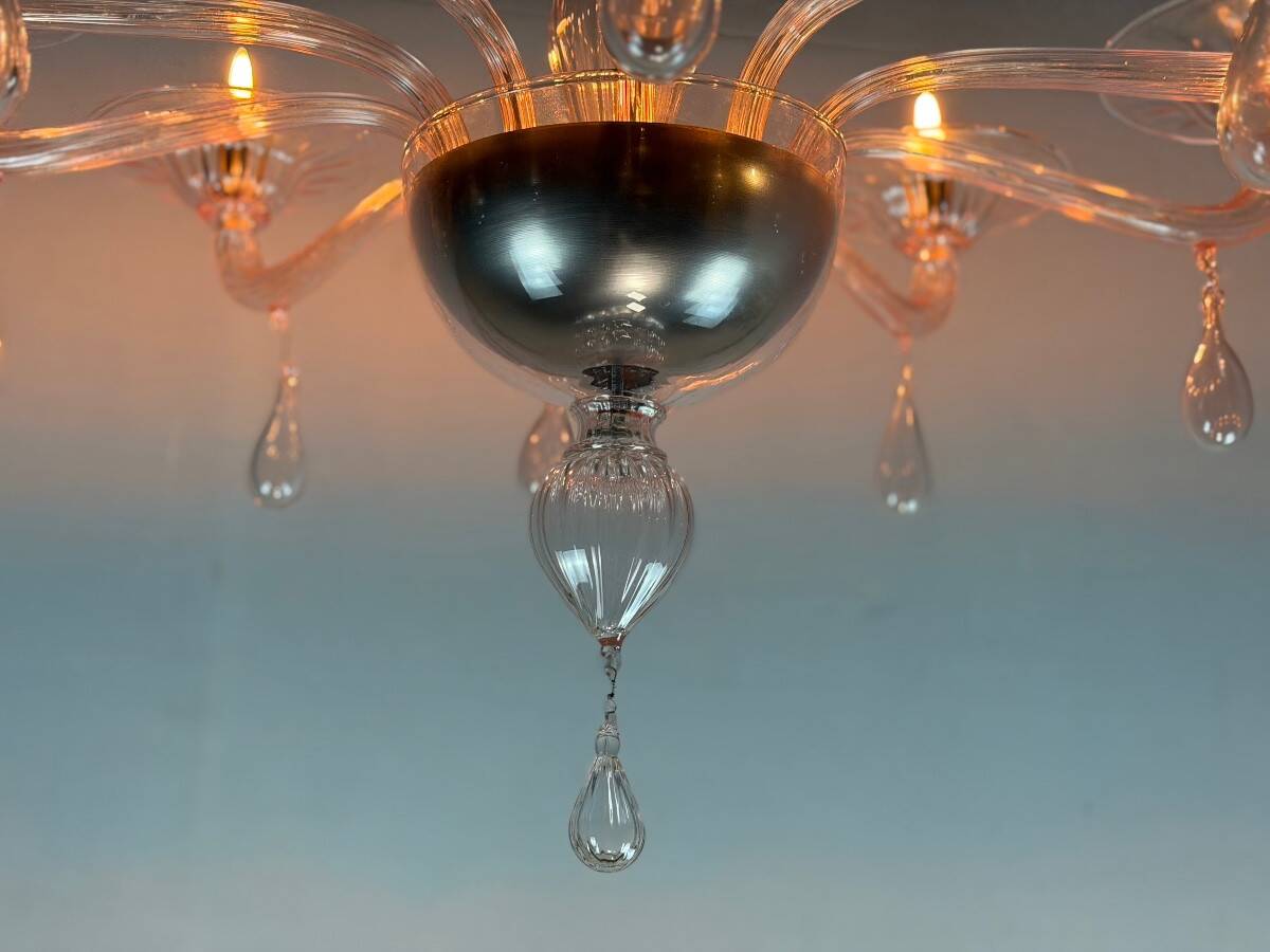 Venetian glass lustre in pink, in the style of Venini.