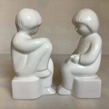 Pair of bookends featuring children reading from the 1970s.