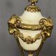 Paire de vases style Louis XVI. Marbre blanc et bronze doré.