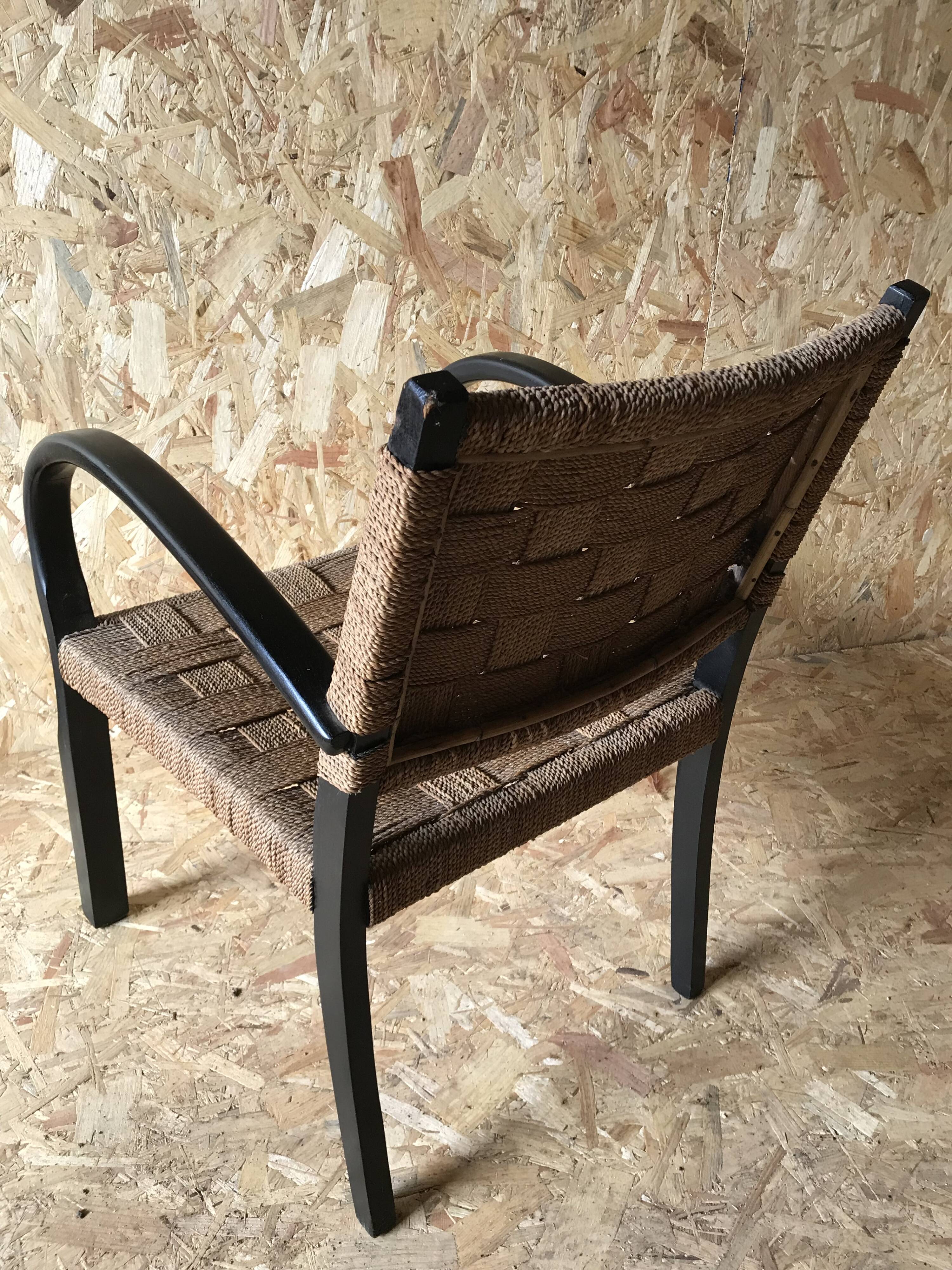 Vintage armchair with woven cord and wooden frame, Axel Larsson, circa 1960.