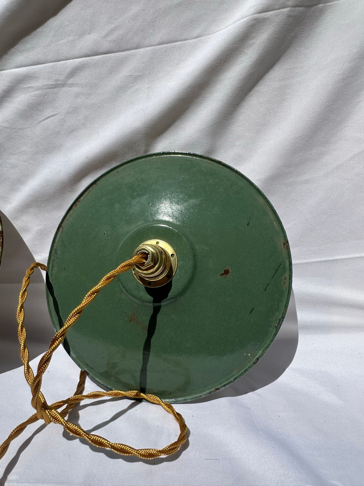 Old suspension pair in green and white enamelled sheet metal.