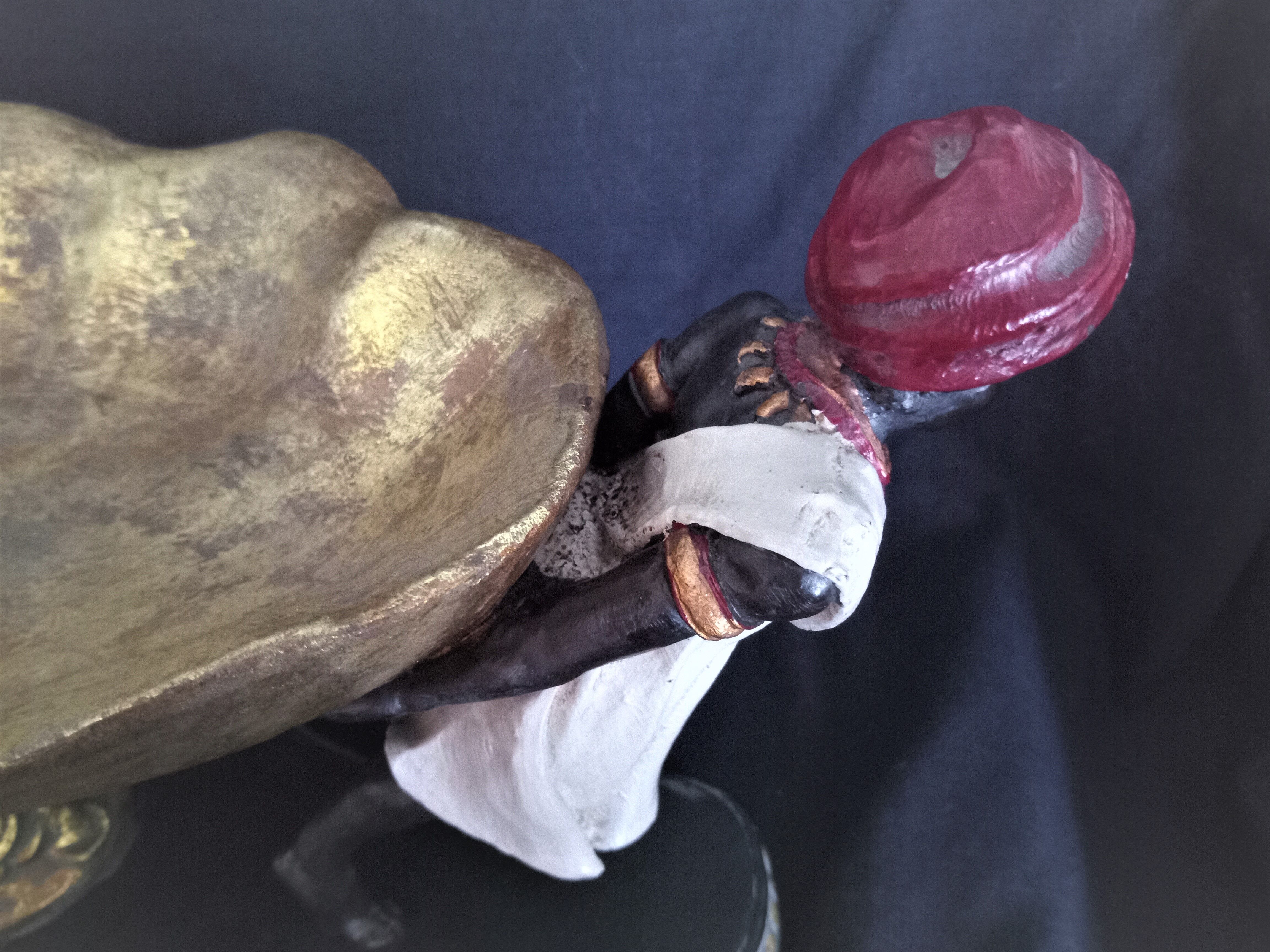 Centerpiece with African characters, plaster, resin and wood