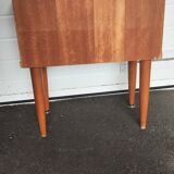 Vintage bedside table from the 70s scandinavian with a flap