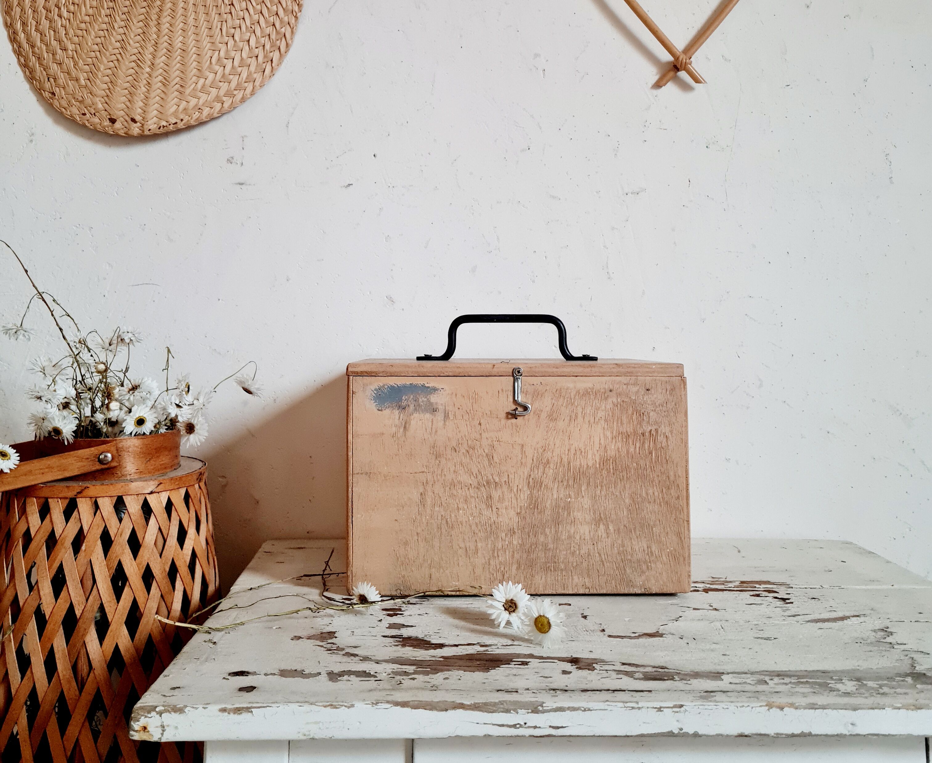 Small trunk in old wooden chest