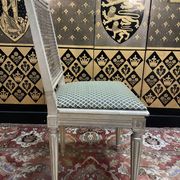 Suite de 4 chaises cannées style Louis XVI Jean Mocque