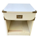White Scandinavian bedside table in boat style made of wood.