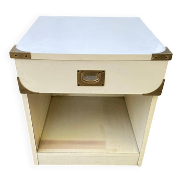 White Scandinavian bedside table in boat style made of wood.