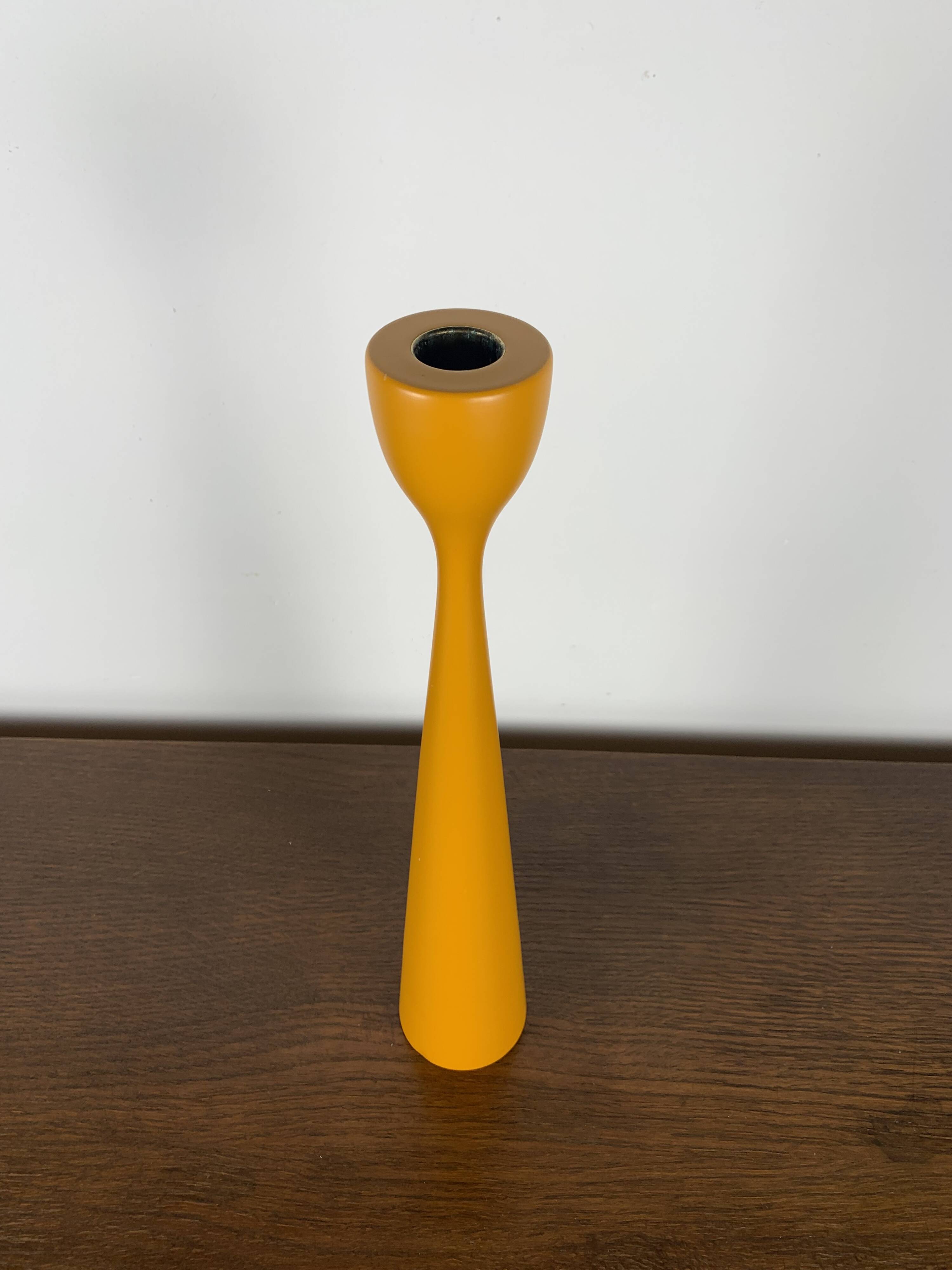 Large candle holder in orange-yellow lacquered wood