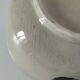 Two large vintage bowls in pastel decor on mini pedestals.