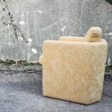 Cubist-inspired armchair with patterned fabric