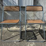 Pair of vintage metal caned folding chairs