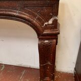 Pair of Louis XIV style fireplaces in red cherry marble. XIX century.