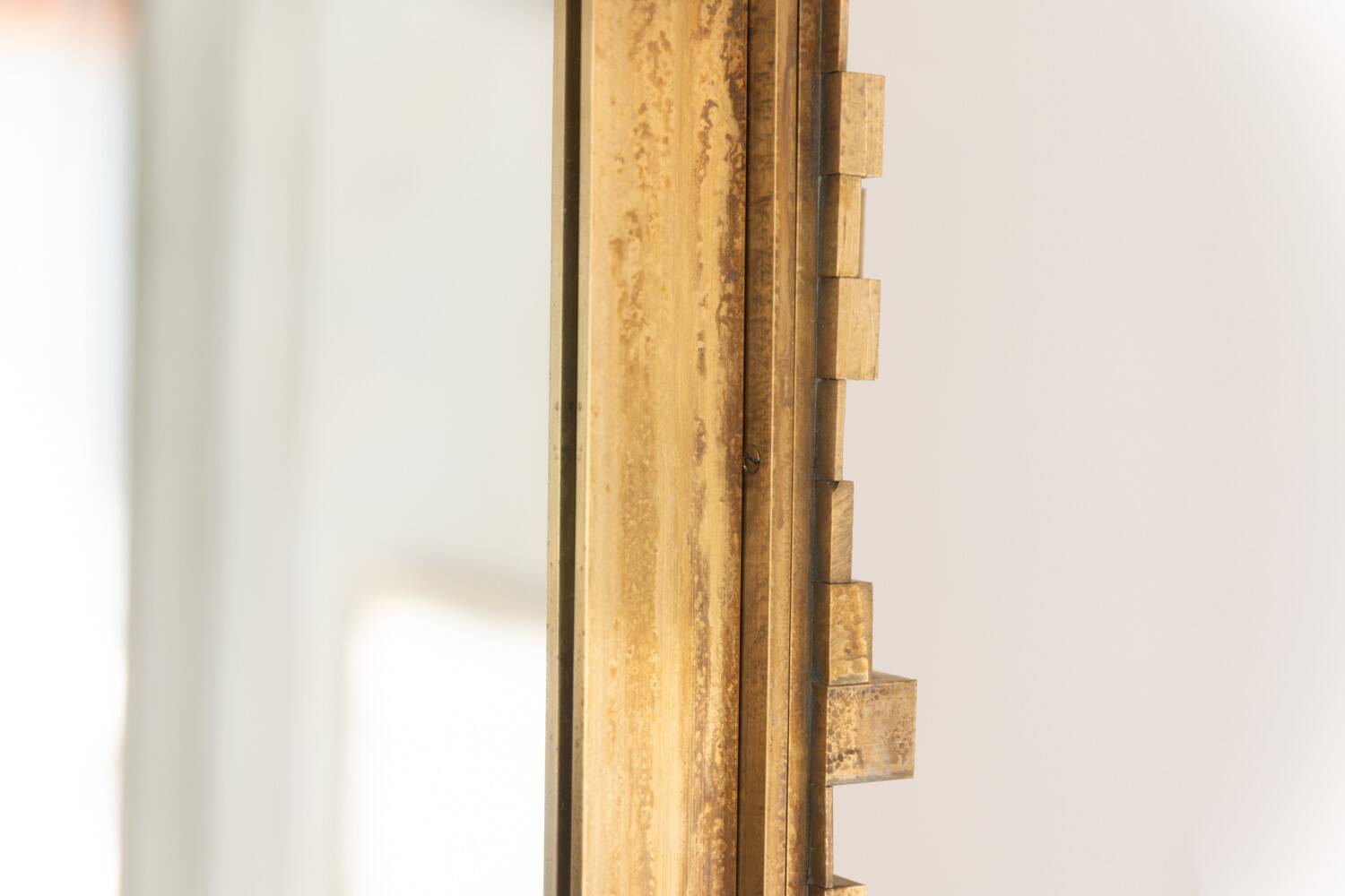 Pair of large mirrors in gilded and patinated brass. Contemporary.