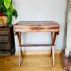 Desk, writing desk in solid rosewood and studded leather, 20th century.