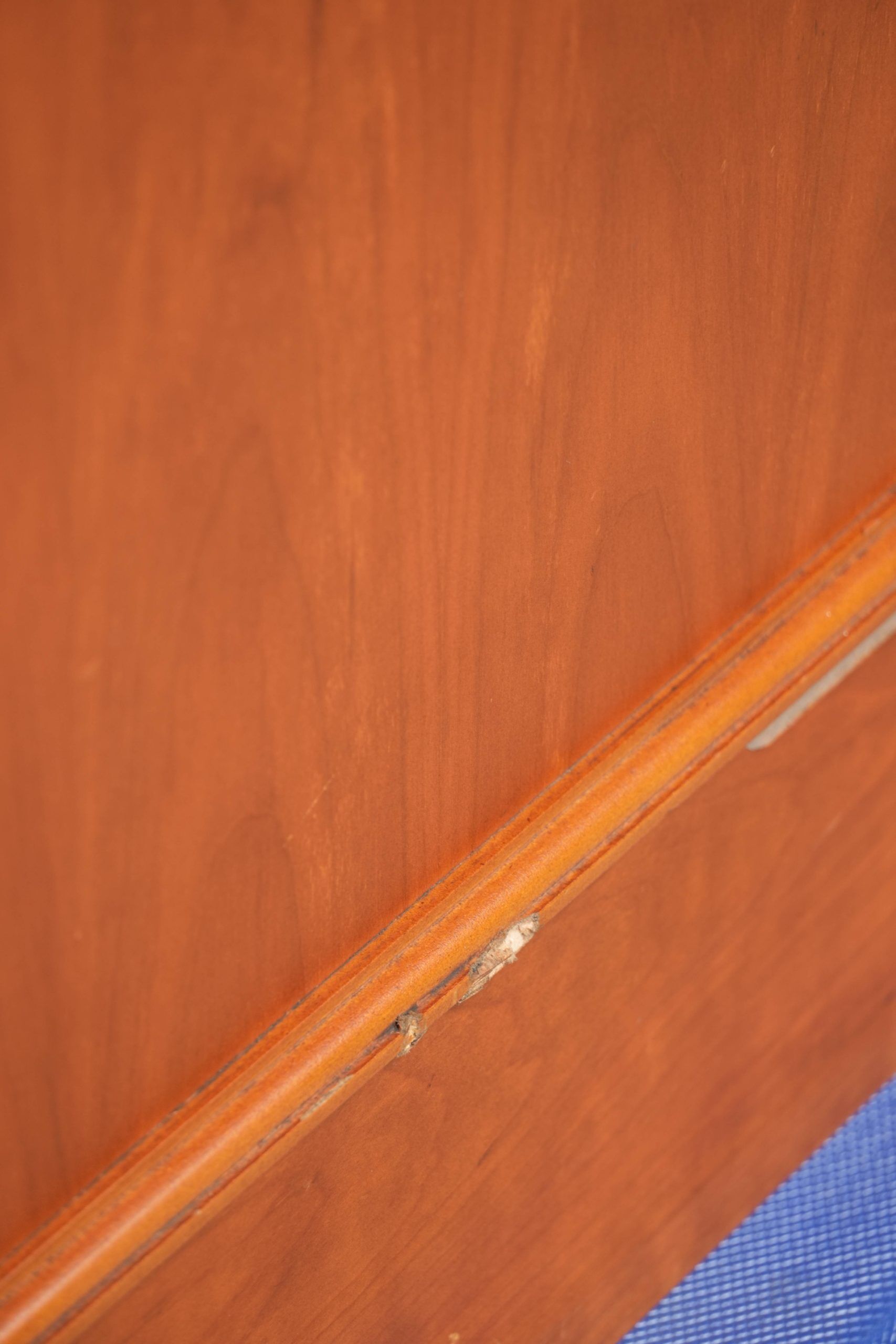 Classic wooden desk in English style with 4 drawers and a blue leather top