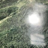 Vintage green sea marble and rosewood table from the 1970s.