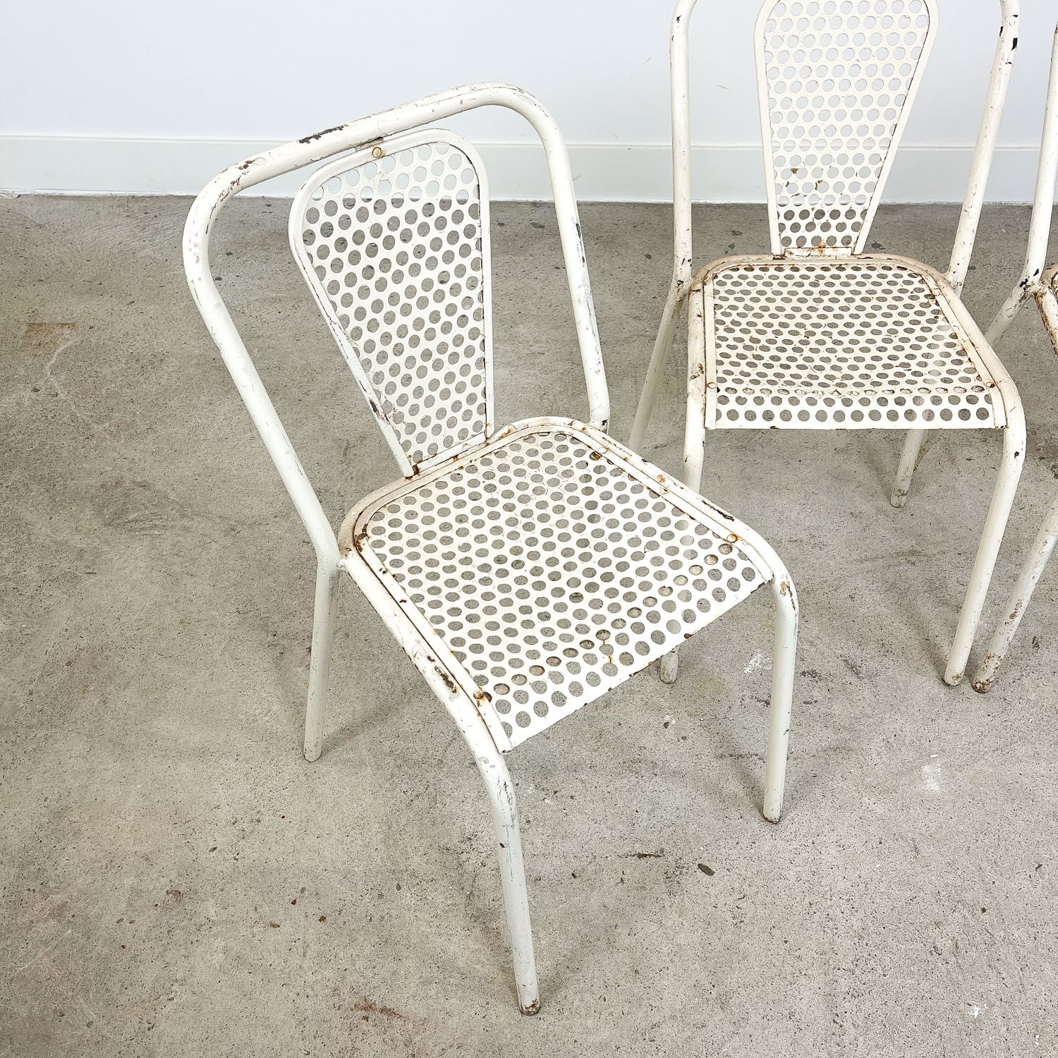 Set of four vintage industrial metal bistro chairs by Rene malaval