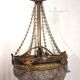 Antique balloon chandelier with pendants, in brass and with mouldings.