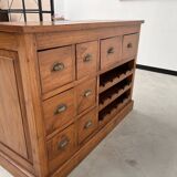 Two-sided paneled counter, bottle storage