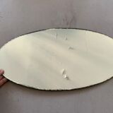 Old beveled oval mirror